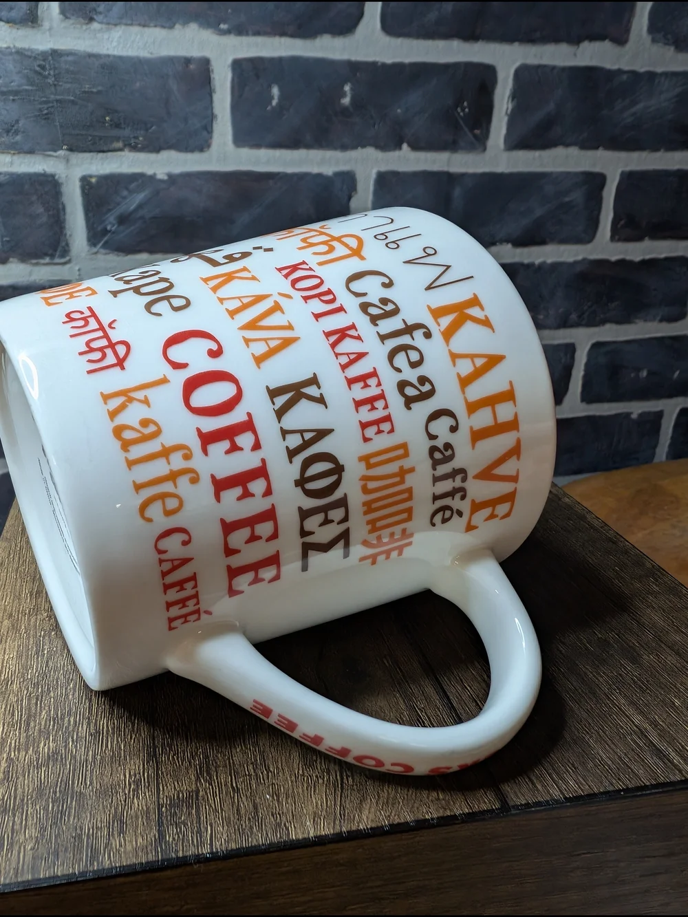 White and Red Coffee Mug with Multilingual 'Coffee' Design